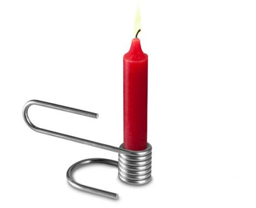 Stainless steel candle holder with red dinner candle